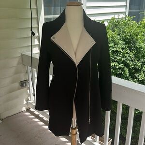 Women’s black and cream coat